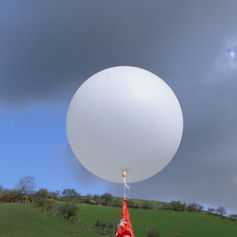 Close-up of a weather balloon being launched